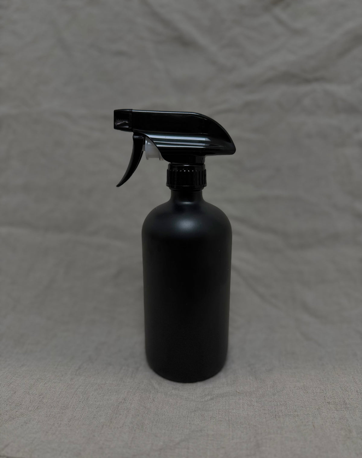 Empty LOMARRA glass bottle with trigger