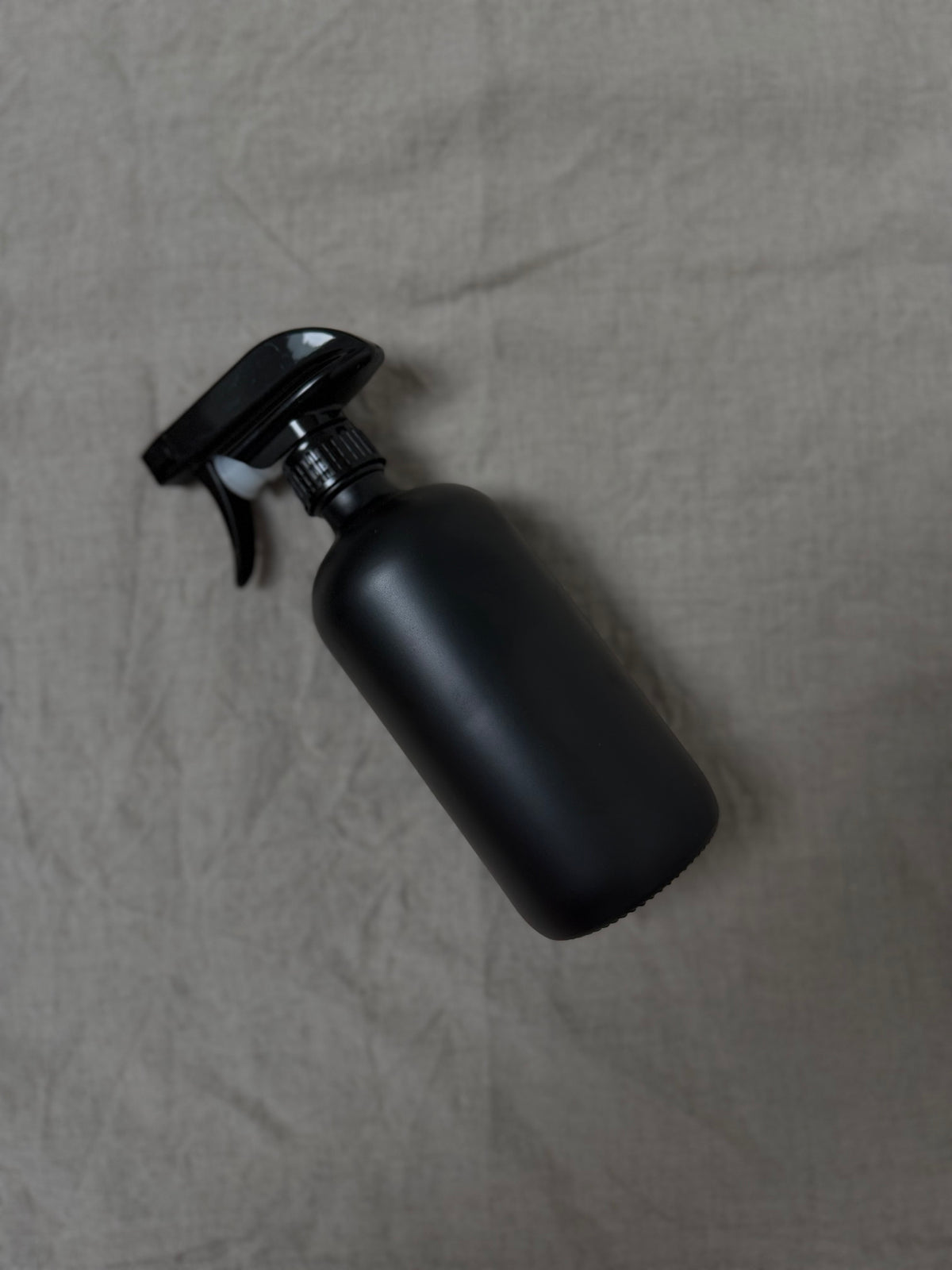 Empty LOMARRA glass bottle with trigger